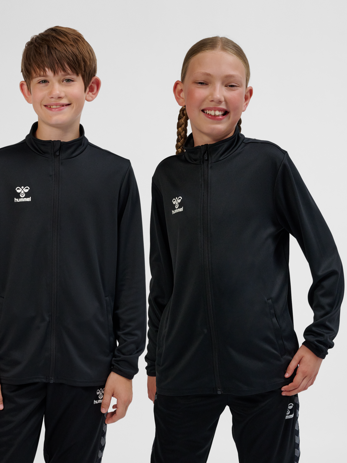 hmlESSENTIAL 2.0 TRACK JACKET KIDS – Bild 1
